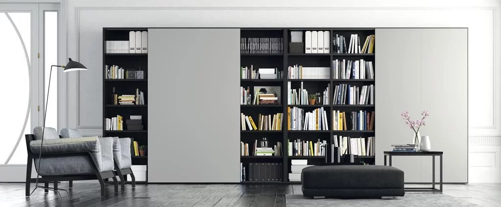 Mueble librería con cuatro puertas correderas