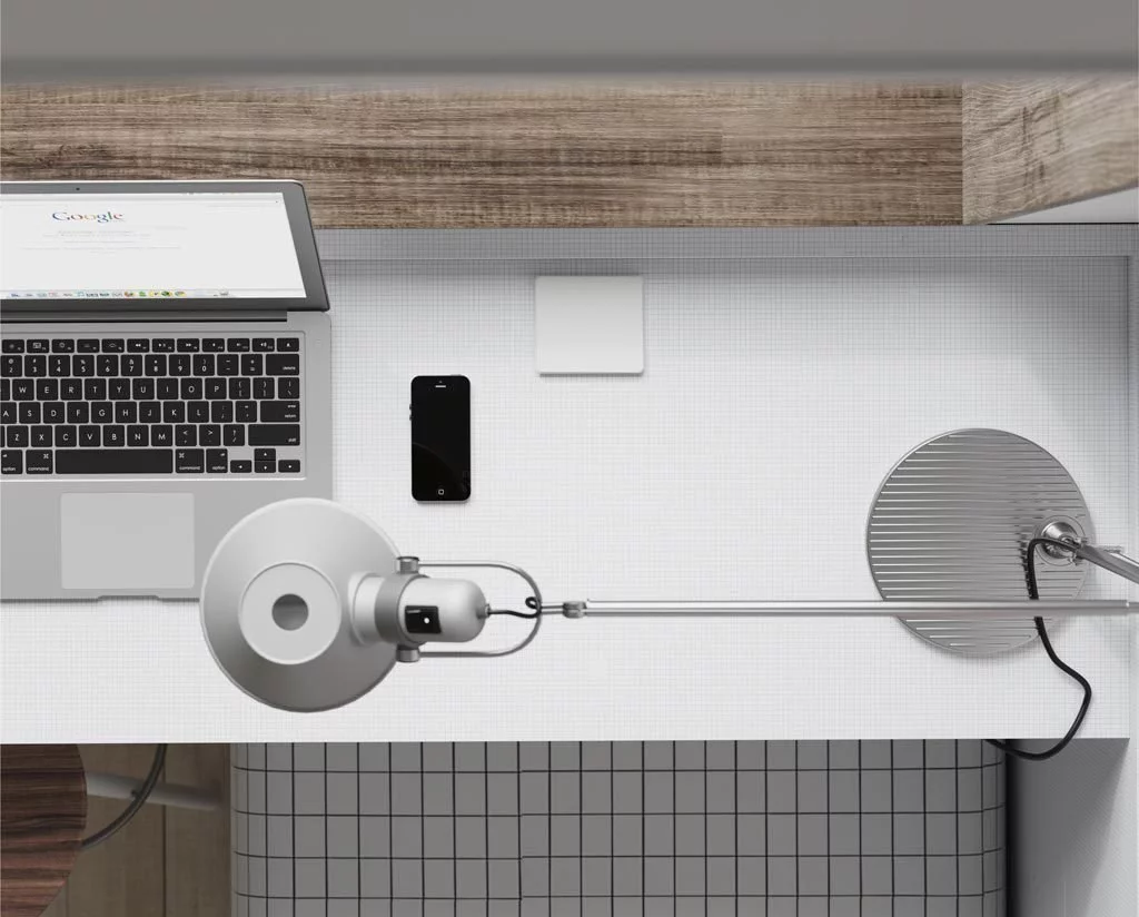 En las mesas de estudio puedes incorporar bases de enchufes y cargadores USB con tapa de protección