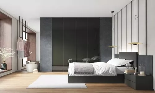 Dormitorio con cabecero tapizado y armrio que combina puertas de cristal y acabado Stone