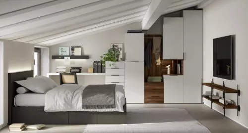 Dormitorio modular con espacio para almacenaje y escritorio integrado
